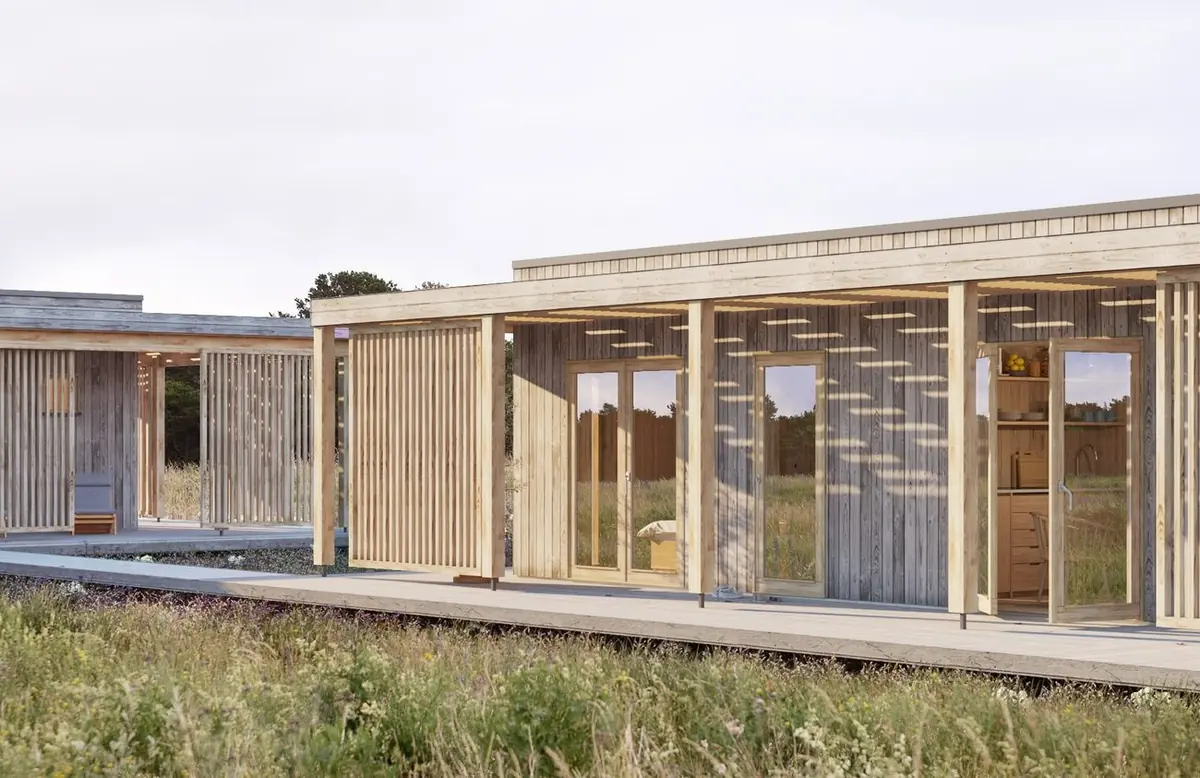 Visualisering: Nära Naturen snett framifrån i dagsljus, altanen längs hela huset